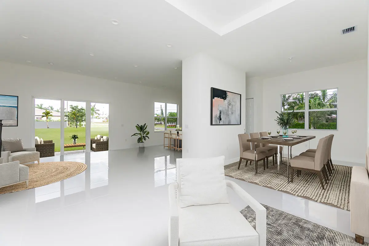 A living room with white walls and floors